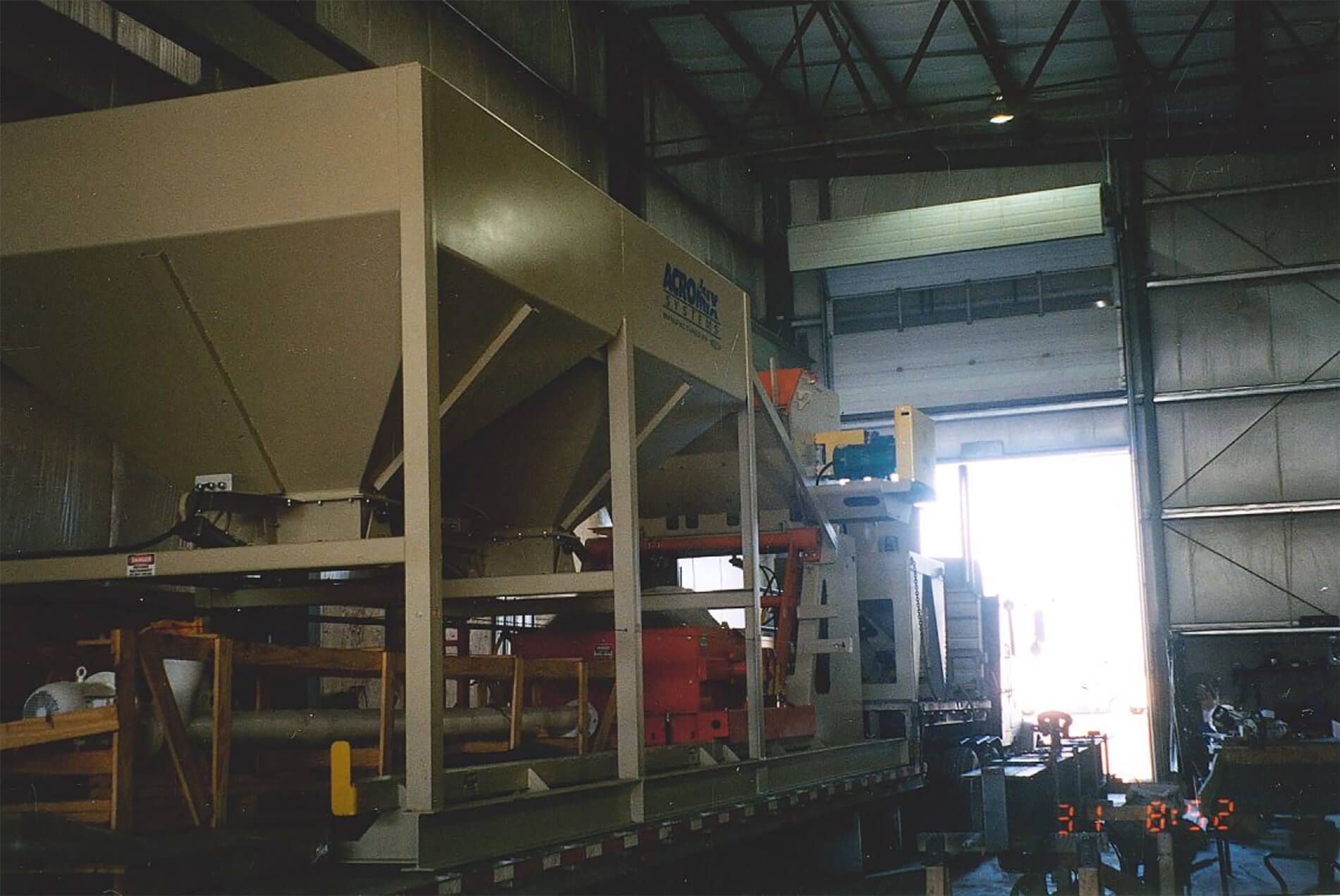 A concrete mixing machine inside of a facility