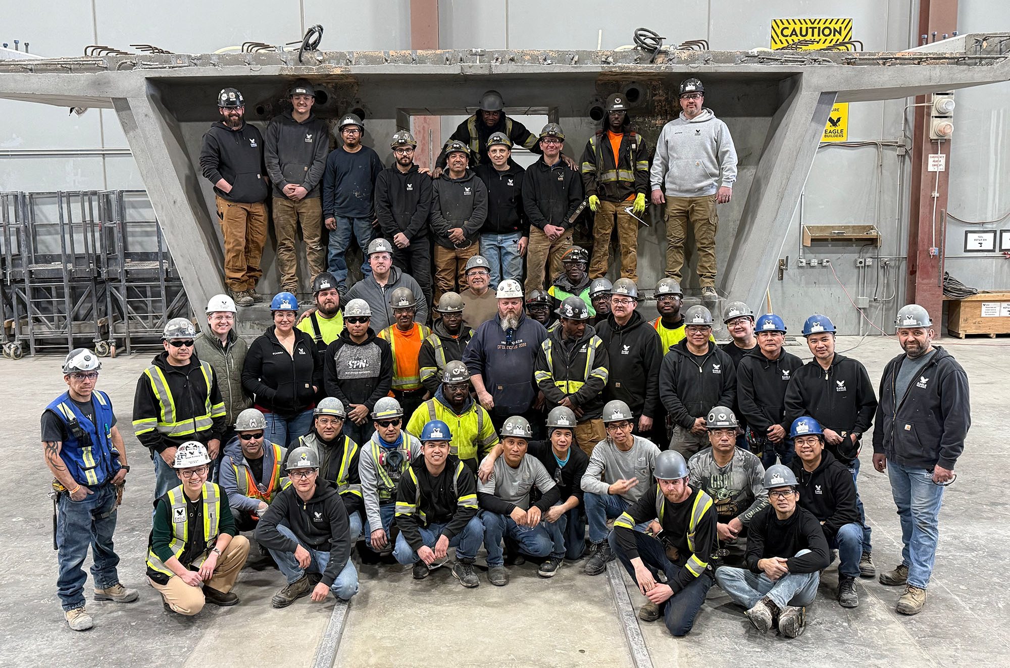 The Eagle Builders team looking at the camera