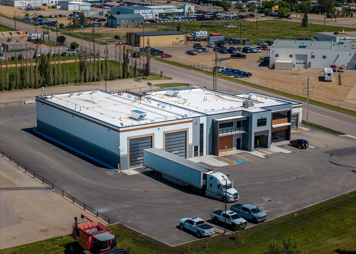 Exterior view of The Works Car & Truck Wash building on a sunny day