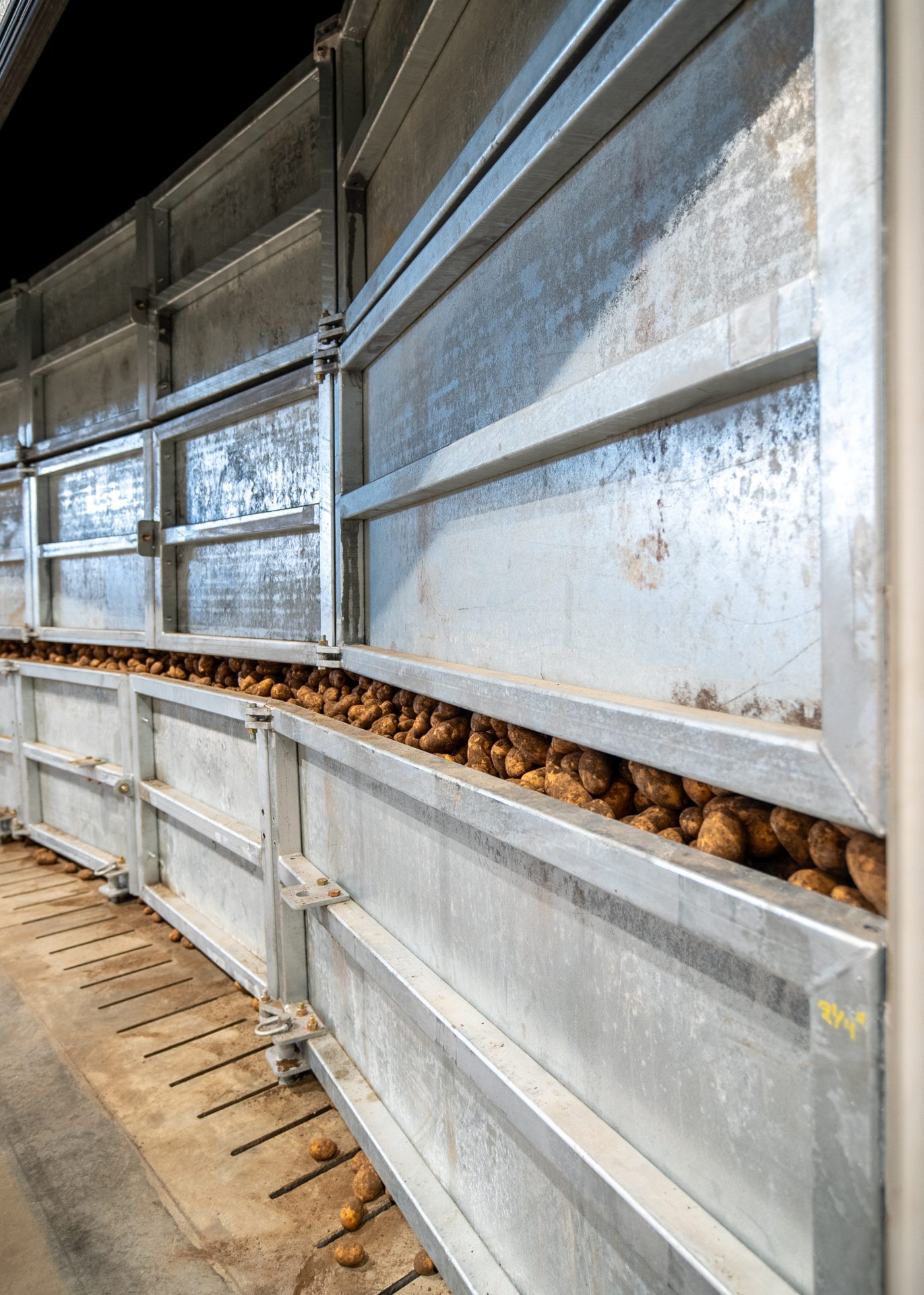 Close-up view of potato storage containers