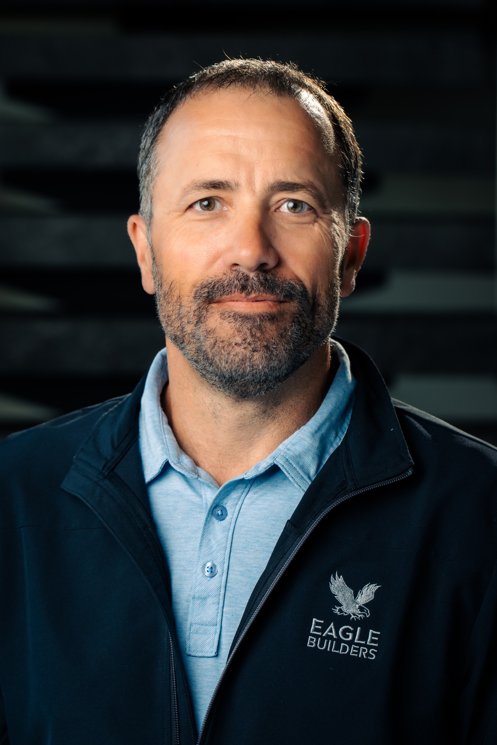 Headshot of Boyd Lotzien, smiling at the camera
