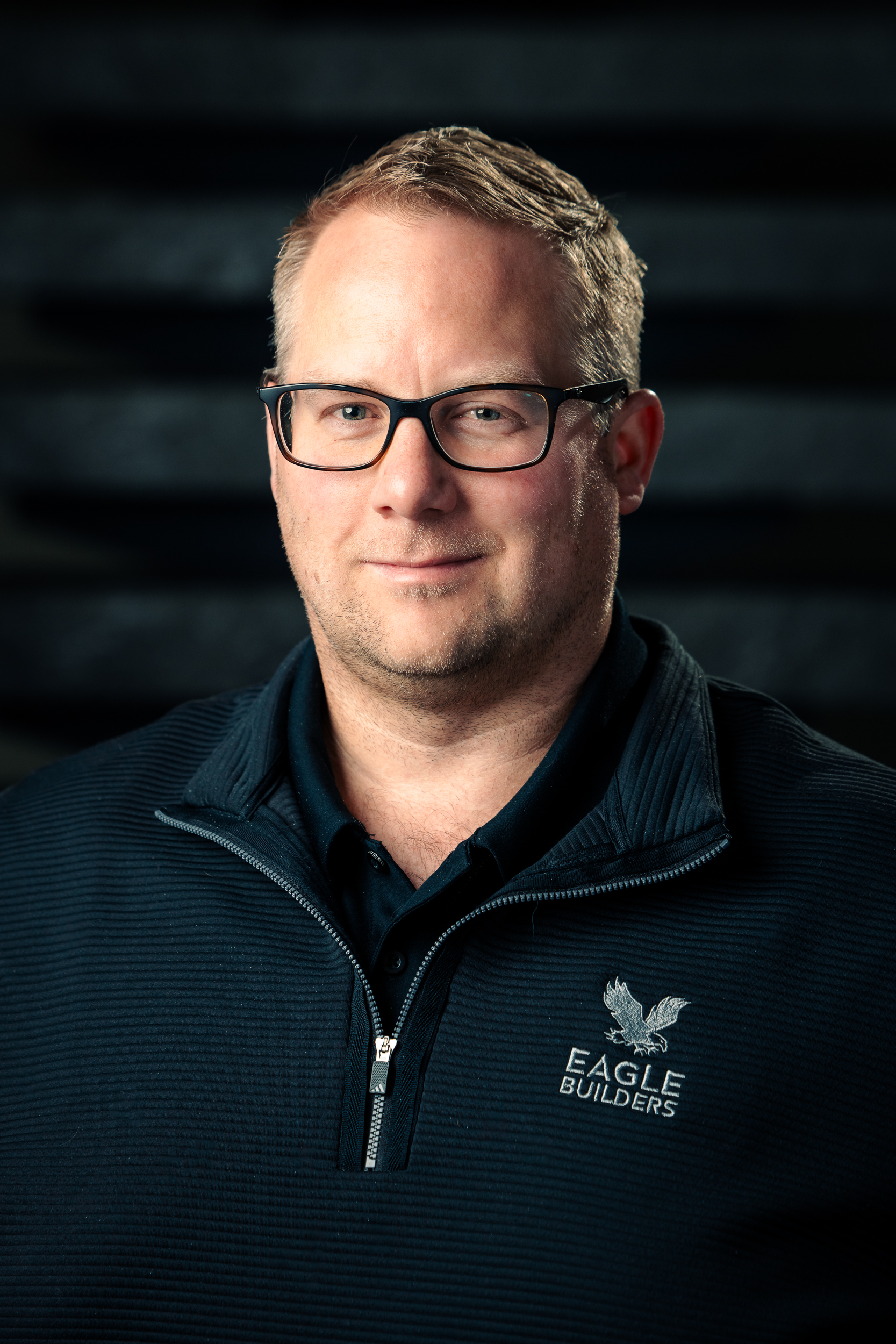 Headshot of Kevin Kooiker, smiling at the camera