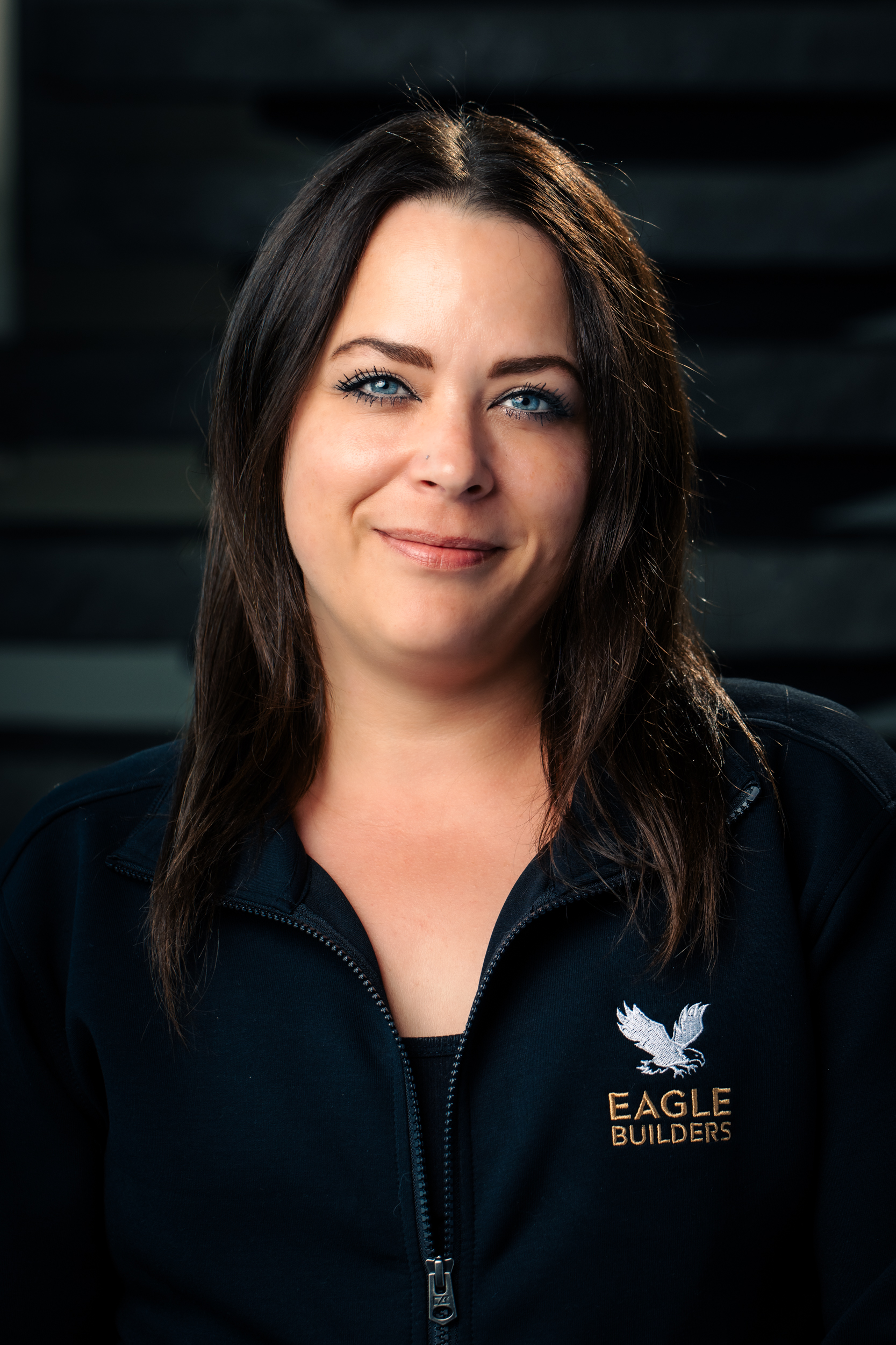 Headshot of Lena Gedaschke, smiling warmly at the camera