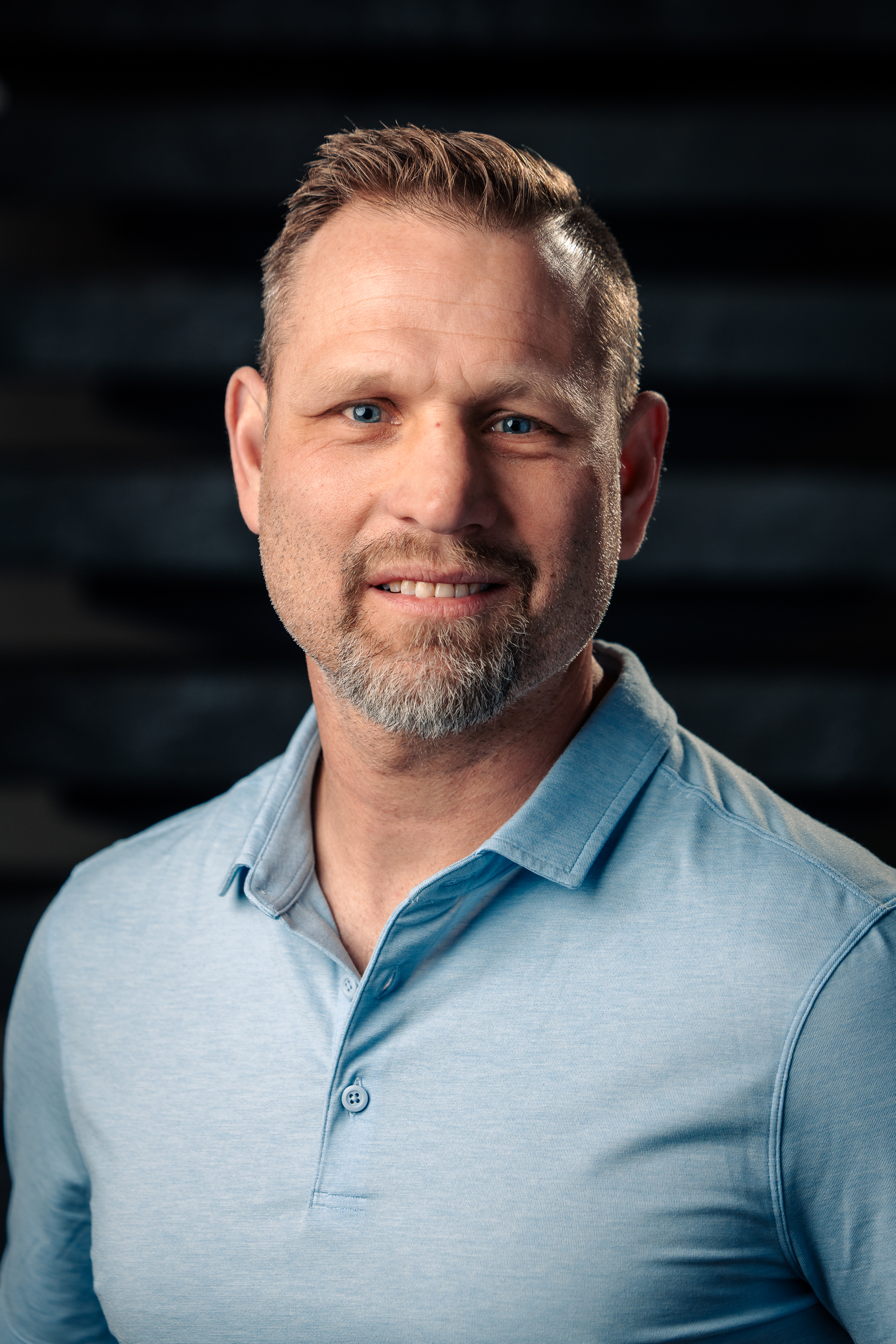 Headshot of Martin Sonnenberg, smiling warmly at the camera