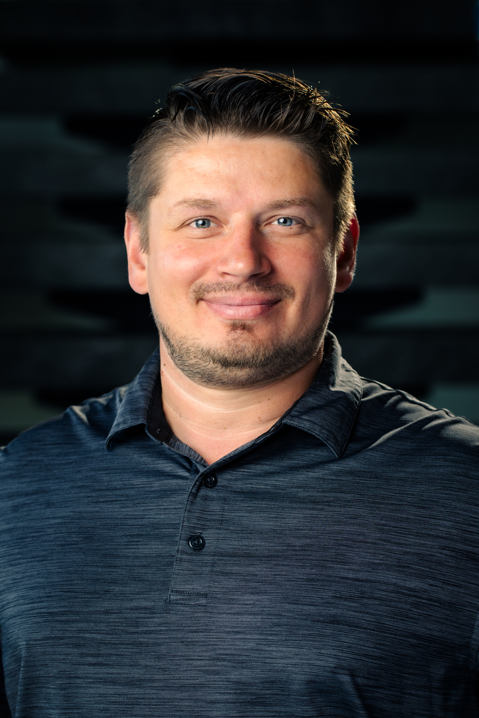 Headshot of Mike Skorobogatko, smiling warmly at the camera
