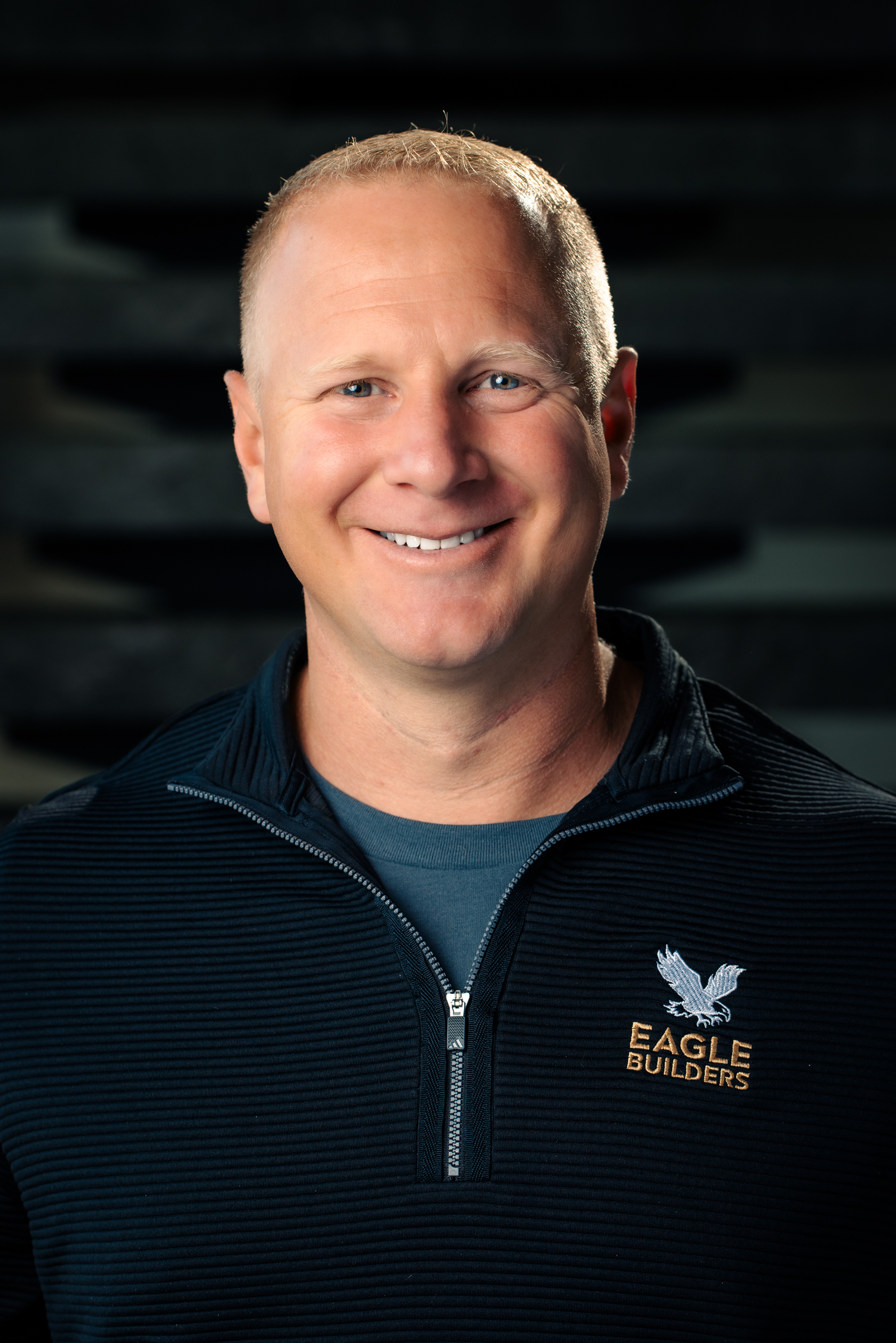 Headshot of Robin Marshall, smiling warmly at the camera